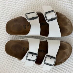 Birkenstock White Sandals with Black Buckles